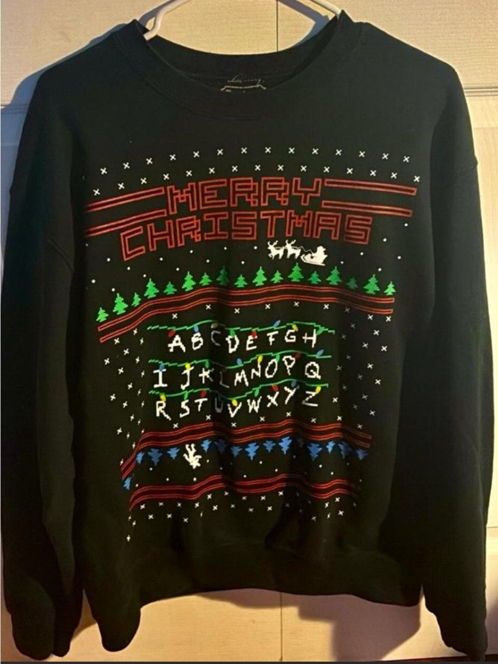 Spencer's Stranger Things Black Merry Christmas Crewneck Sweater